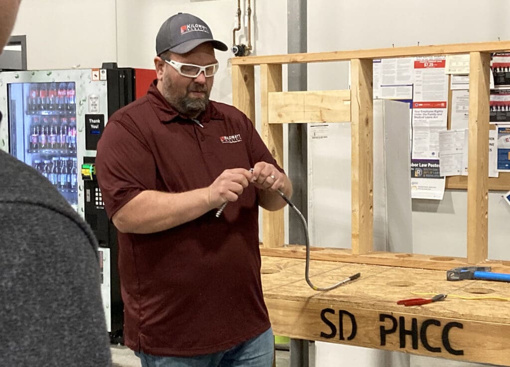 A Black Hills Local Electrician teaches students about wiring types